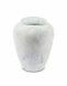Light blue ceramic cremation urn for ashes with marble look