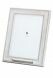 Wooden photo frame with small tube for cremation ashes