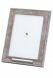 Wooden photo frame with small tube for cremation ashes