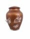 Rusty brown crystal glass cremation urn with butterflies
