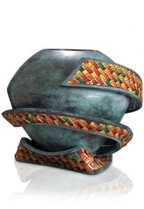 Bronze cremation urn covered in mosaic 'Spazio involto'