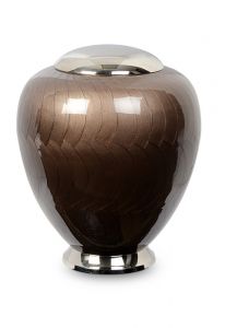 Brown cremation urn made from cast brass with silver lid