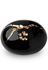 Black pet urn 'Kintsugi' with gold-coloured paw
