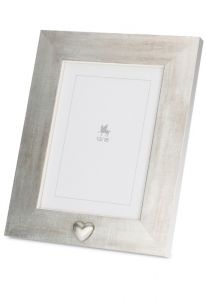 Photo frame urn with small silver heart for cremation ashes