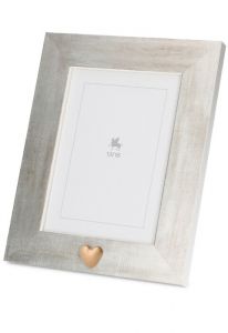 Photo frame urn with small golden heart for cremation ashes