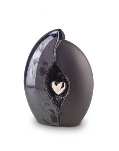 Ceramic urn with silver heart