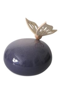 Handmade purple infant cremation urn with wooden butterfly