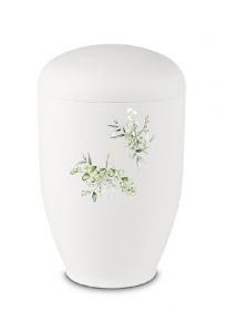 Metal cremation urn for ashes white with dried flowers