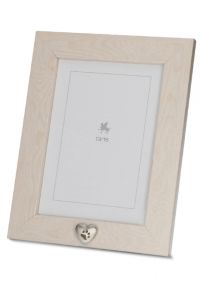 Photo frame urn with small silver pawprint heart for ashes