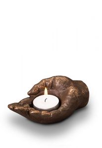 Hand-shaped keepsake urn with candle holder