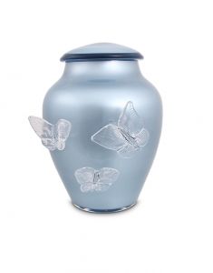 Blue crystal glass cremation urn with butterflies