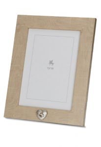 Light brown photo frame urn with small silver pawprint heart for cremation ashes