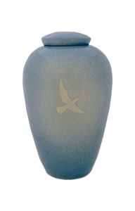 Ceramic funeral urn with a dove